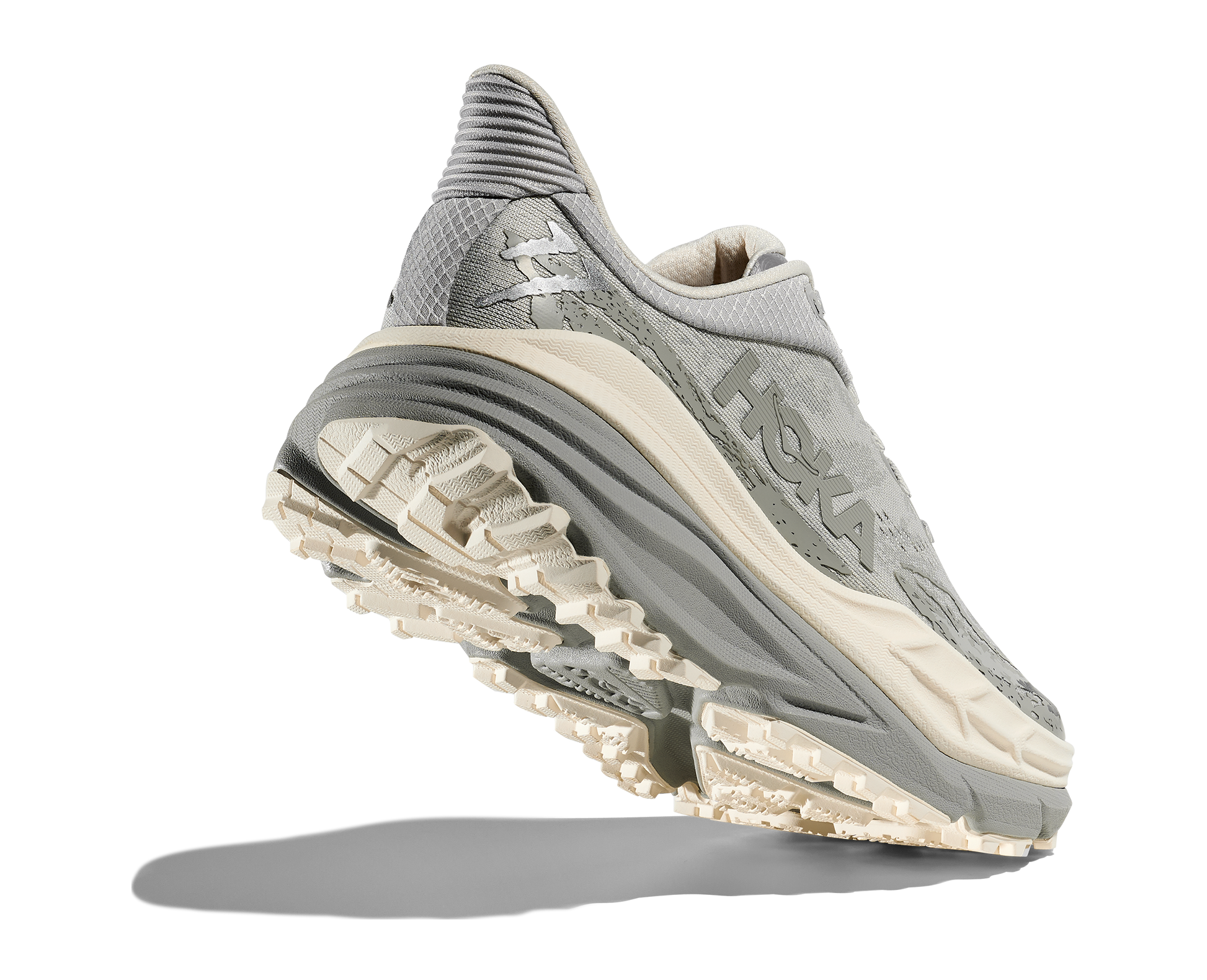 Hoka Stinson 7 M, herrmodell. Hybridsko för alla underlag. En av Hokas stabilaste skor med pronationsstöd. En väldämpad sko som avlastar rygg och knä.  Gråa och vita nyanser på denna sko.