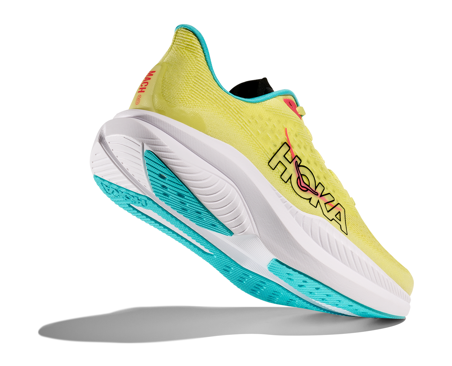 Hoka M Mach 6, superskum med syretillförsel i gummit för att minimera vikt och skapa en så responsiv sko som möjligt. Mach 6 är en snabb löparsko för intervallpass, tävling och löpbandet. Färgen här är gul med vit sula och med detaljer i blått och rosa. Köpt hos oss, din Hoka specialist i Sverige.