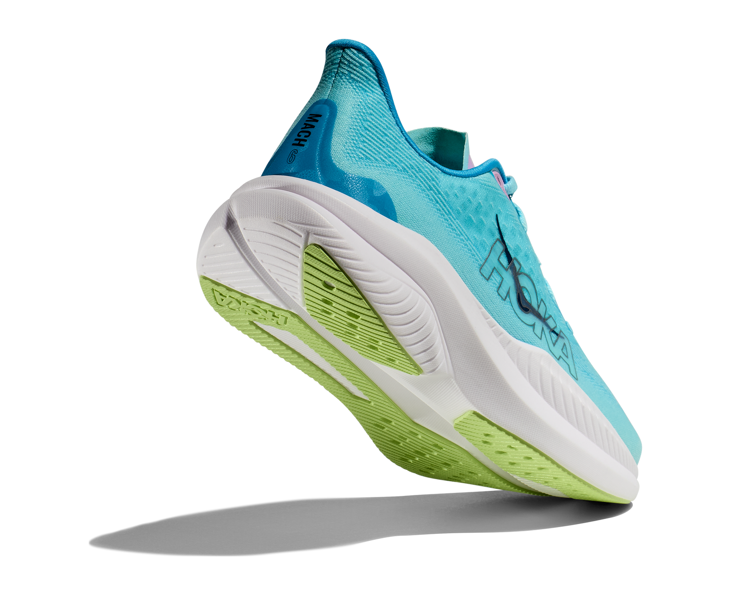 Hoka W Mach 6 (CSSW) - En snabb löparsko med skön dämpning. Blå/Vitt färg med lila och gröna detaljer.