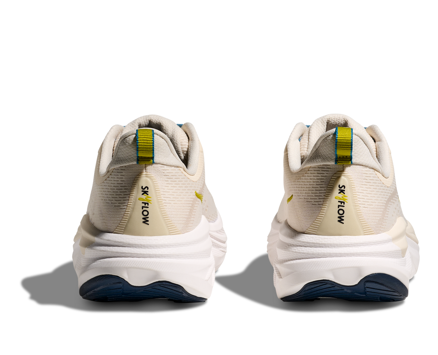 Hoka Skyflow M, löparskor i beige och vit färg med detaljer i blått, gult och svart. Dämpad och stabil sko som är gjord för asfalt och grusvägar. Köp hos oss, din Hoka specialist i Sverige!
