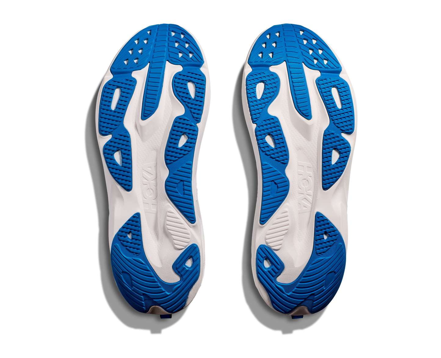 Hoka M Skyflow. Utmärkt sko för att lägga något lite extra på dagens runda! Blå med vit sula och detaljer i limegrön och svart.