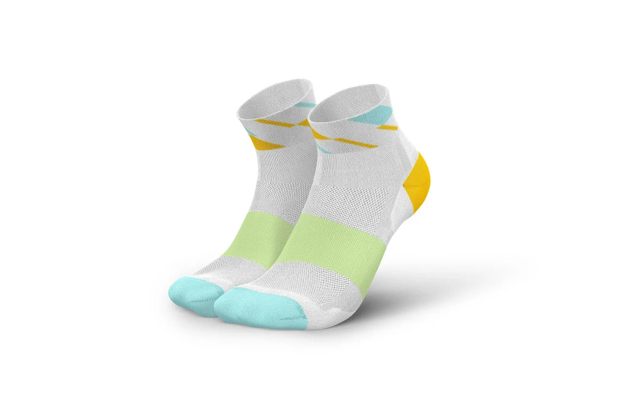 Incylence Ultralight Angles Short Mint Yellow. Ultratunn strumpa för träning och bäst till löpning. Vit med gul, turkos och ljusgrön detalj.