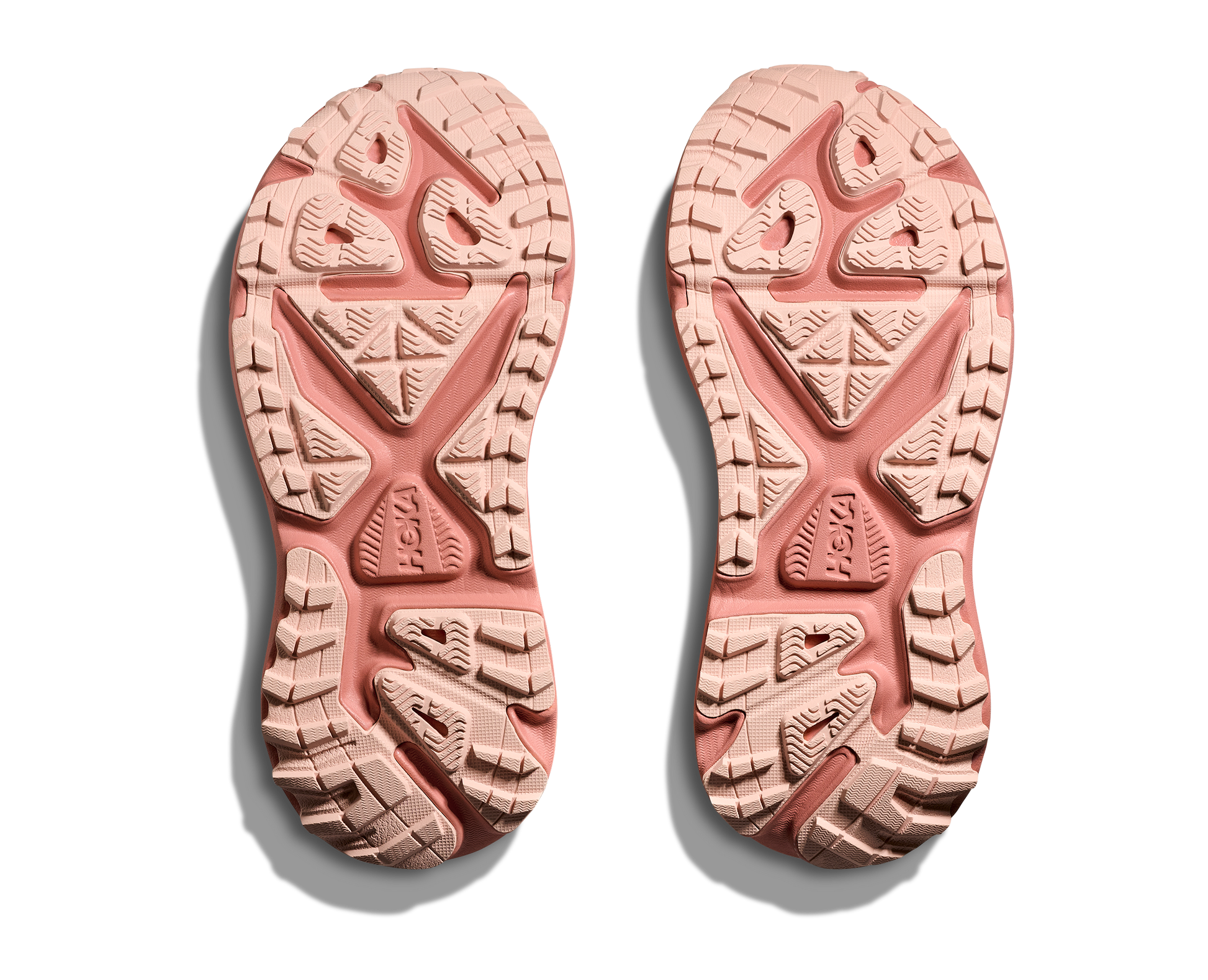 Hoka Stinson 7 W, dammodell. Hybridsko för alla underlag. En av Hokas stabilaste skor med pronationsstöd. En väldämpad sko som avlastar rygg och knä. Färgen här är rosa och beige. 