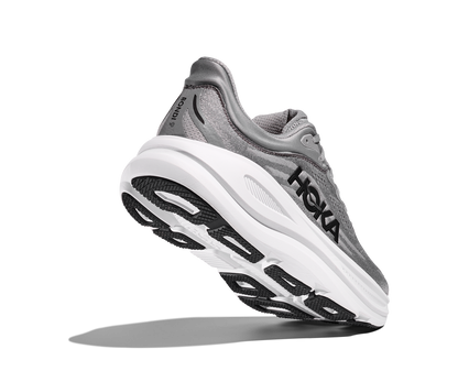 Hoka M Bondi 9, dämpad herrsko. Perfekt för en mjuk och skonsam löpning. Även en super bra arbetssko som avlastar kroppen under hela dagen. Här i grå färg med vit sula och svarta detaljer. Köp hos dina Hoka specialister i Sverige idag!
