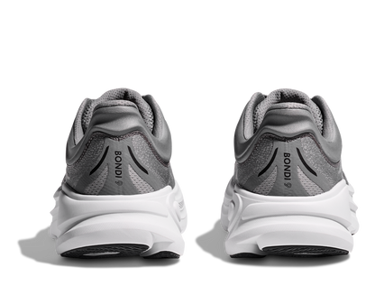 Hoka M Bondi 9, dämpad herrsko. Perfekt för en mjuk och skonsam löpning. Även en super bra arbetssko som avlastar kroppen under hela dagen. Här i grå färg med vit sula och svarta detaljer. Köp hos dina Hoka specialister i Sverige idag!