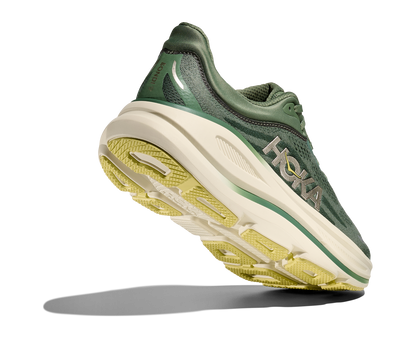 Hoka M Bondi 9, dämpad herrsko. Perfekt för en mjuk och skonsam löpning. Även en super bra arbetssko som avlastar kroppen under hela dagen.  Här i grön nyans med beige sula och gula detaljer.  Köp hos dina Hoka specialister i Sverige idag!
