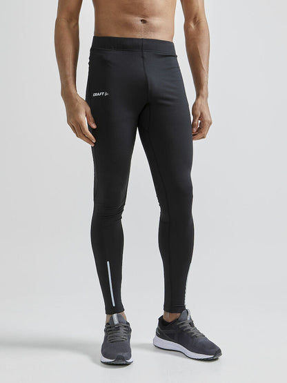 Craft ADV Essence Warm Tights. Svarta tights med elastisk resår i midjan samt dragsko för perfekt passform. Ficka med blixtlås baktill. Reflekterande detaljer samt logga på låret.