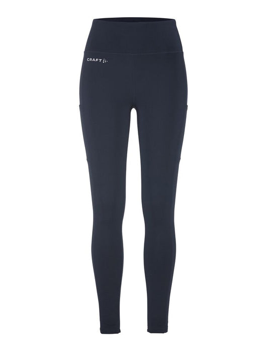 Craft ADV Essence High Waist Warm Tights. Mörkblå tights i dammodell med bred resår i midjan. Två stora ytterfickor på benen samt nyckelficka i midjan. 