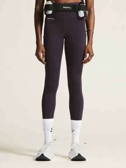 Craft ADV Essence High Waist Warm Tights. Lila tights i dammodell med bred resår i midjan. Två stora ytterfickor på benen samt nyckelficka i midjan. 