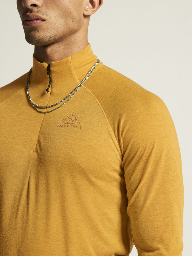 ADV SubZ Wool LS Tee 3 Gul Långärmad polotröja med dragkedja i halsen. Merinoull-blandning för värme och komfort. Hål för tumme ärmslut. Reflekterande detaljer. Ventilerande mesh-panel i rygg. 