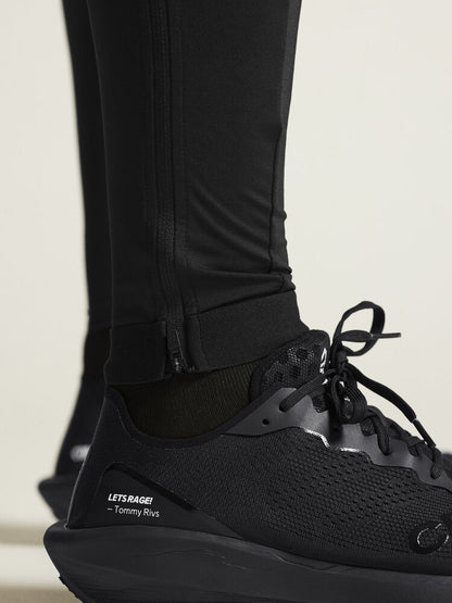 Svarta tights med bred resår i midjan samt dragsko för perfekt passform. Mobilficka på benet med dragkedja samt tre meshfickor baktill för gel etc. Dragkedja benslut.