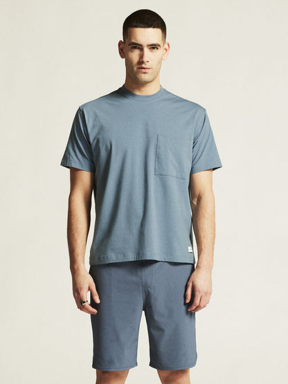 Craft Collective Relaxed SS Tee M. Blå, avslappnad t-shirt till herr för träning och vardag. Bröstficka på vänster sida. Craft etikett nedtill på vänster sida. 